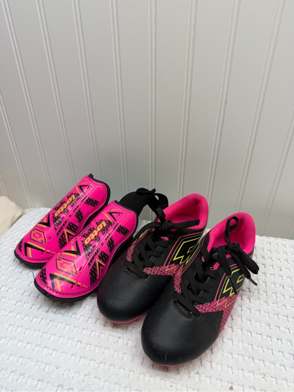 OTTO Black and Hot Pink Kids Soccer Cleats with Pink Shin Guards